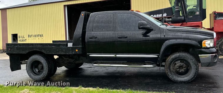 image for item DQ0834 2005 Dodge  Ram 3500 Quad Cab flatbed pickup truck