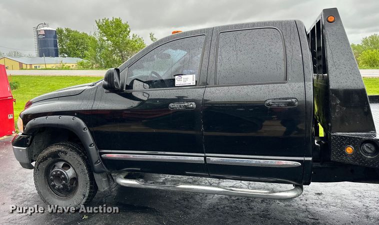 image for item DQ0834 2005 Dodge  Ram 3500 Quad Cab flatbed pickup truck