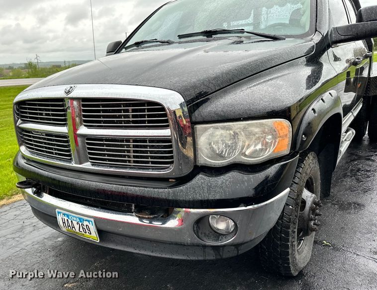 image for item DQ0834 2005 Dodge  Ram 3500 Quad Cab flatbed pickup truck