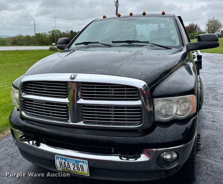 image for item DQ0834 2005 Dodge  Ram 3500 Quad Cab flatbed pickup truck