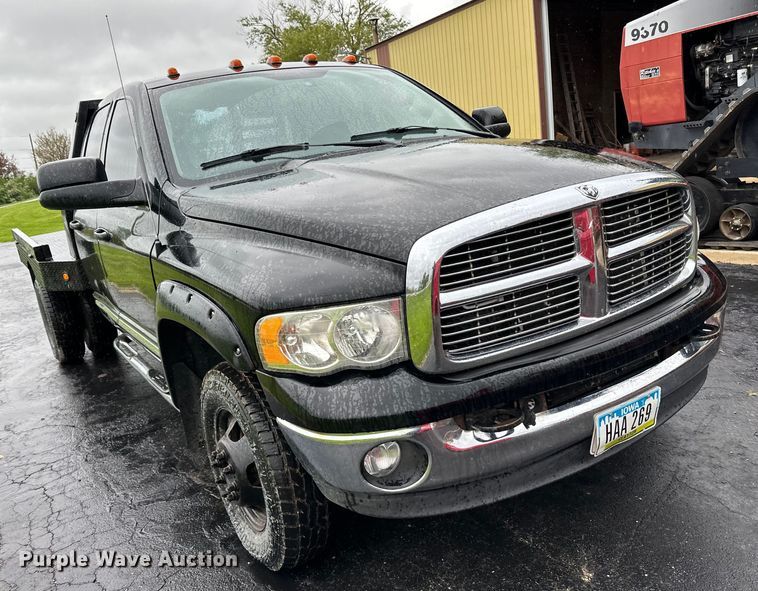 image for item DQ0834 2005 Dodge  Ram 3500 Quad Cab flatbed pickup truck