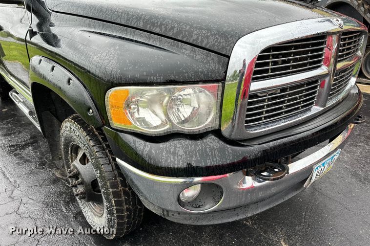 image for item DQ0834 2005 Dodge  Ram 3500 Quad Cab flatbed pickup truck