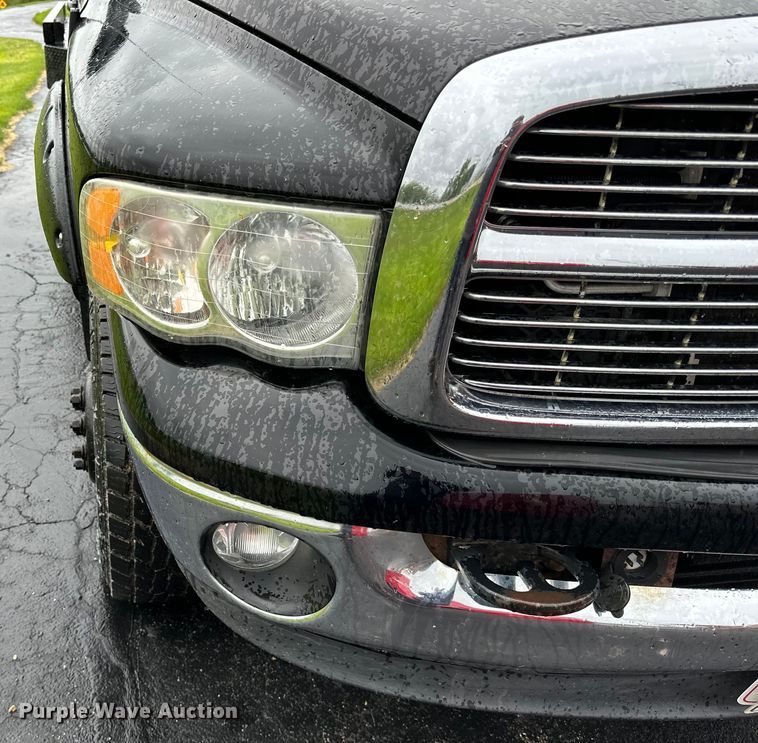 image for item DQ0834 2005 Dodge  Ram 3500 Quad Cab flatbed pickup truck