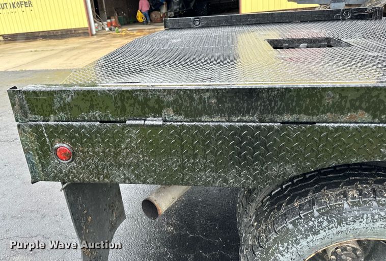 image for item DQ0834 2005 Dodge  Ram 3500 Quad Cab flatbed pickup truck