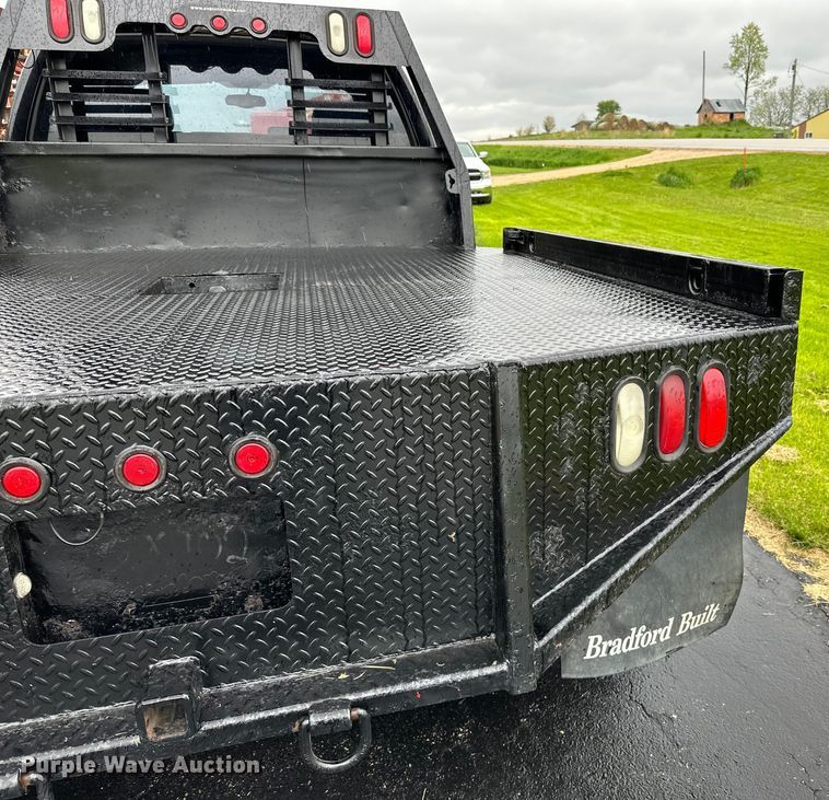 image for item DQ0834 2005 Dodge  Ram 3500 Quad Cab flatbed pickup truck