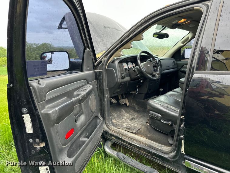 image for item DQ0834 2005 Dodge  Ram 3500 Quad Cab flatbed pickup truck