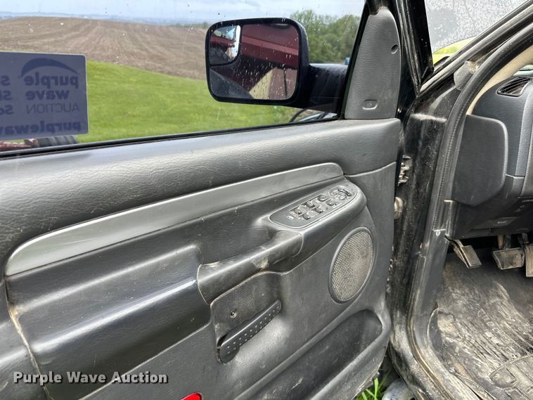 image for item DQ0834 2005 Dodge  Ram 3500 Quad Cab flatbed pickup truck