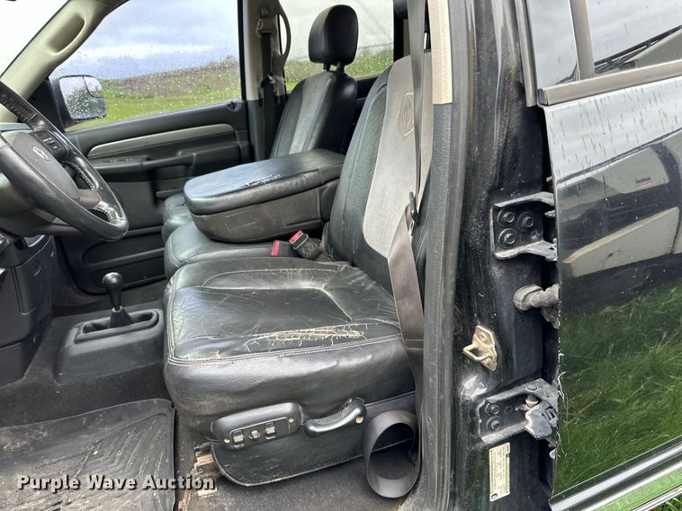 image for item DQ0834 2005 Dodge  Ram 3500 Quad Cab flatbed pickup truck