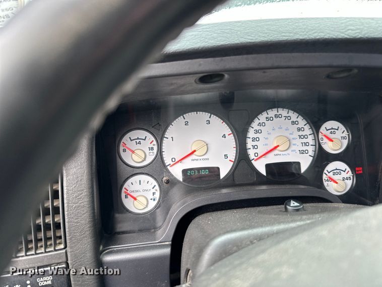 image for item DQ0834 2005 Dodge  Ram 3500 Quad Cab flatbed pickup truck