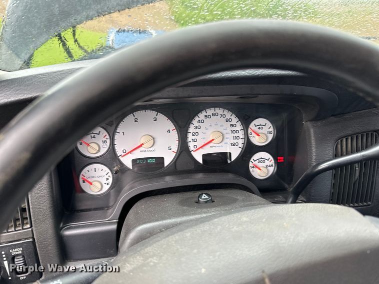 image for item DQ0834 2005 Dodge  Ram 3500 Quad Cab flatbed pickup truck