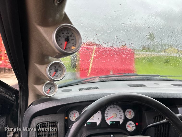 image for item DQ0834 2005 Dodge  Ram 3500 Quad Cab flatbed pickup truck