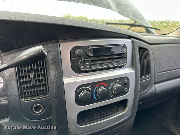 image for item DQ0834 2005 Dodge  Ram 3500 Quad Cab flatbed pickup truck