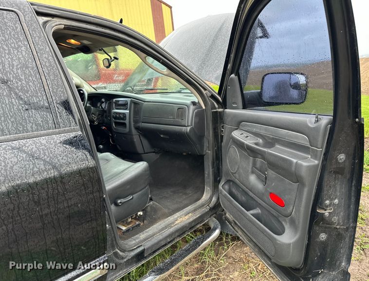 image for item DQ0834 2005 Dodge  Ram 3500 Quad Cab flatbed pickup truck