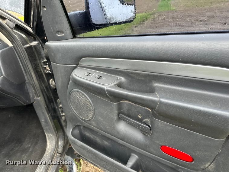 image for item DQ0834 2005 Dodge  Ram 3500 Quad Cab flatbed pickup truck