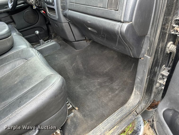 image for item DQ0834 2005 Dodge  Ram 3500 Quad Cab flatbed pickup truck