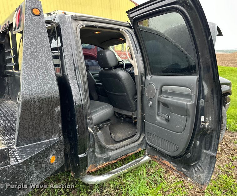 image for item DQ0834 2005 Dodge  Ram 3500 Quad Cab flatbed pickup truck