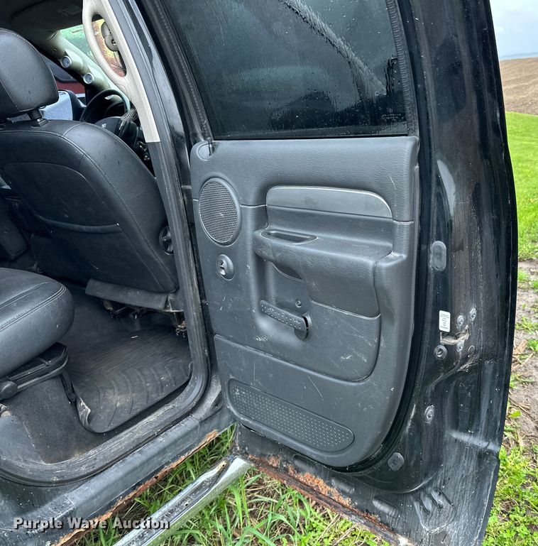 image for item DQ0834 2005 Dodge  Ram 3500 Quad Cab flatbed pickup truck