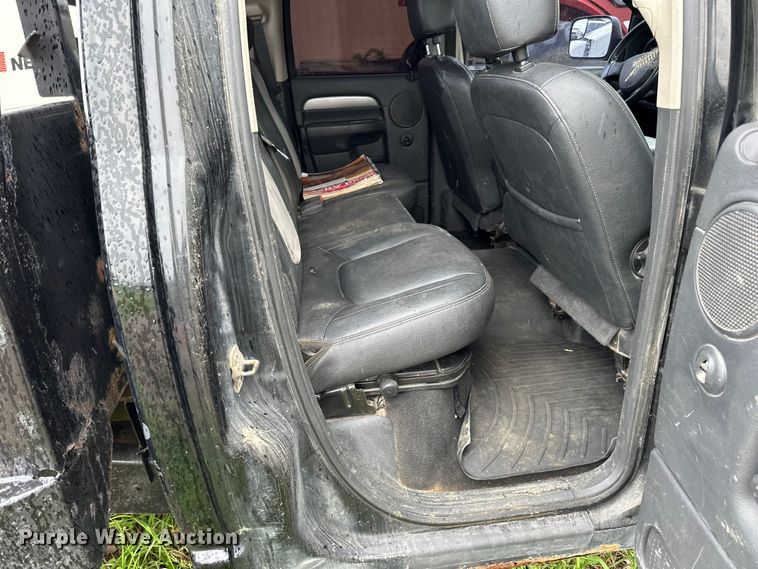 image for item DQ0834 2005 Dodge  Ram 3500 Quad Cab flatbed pickup truck