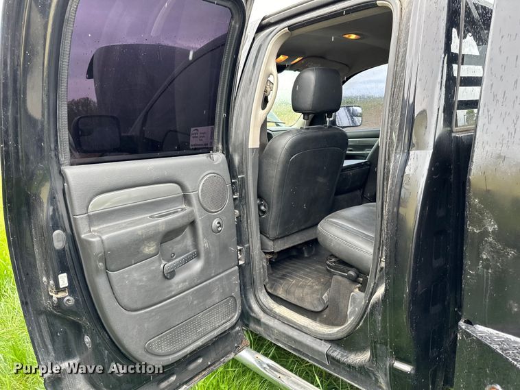 image for item DQ0834 2005 Dodge  Ram 3500 Quad Cab flatbed pickup truck