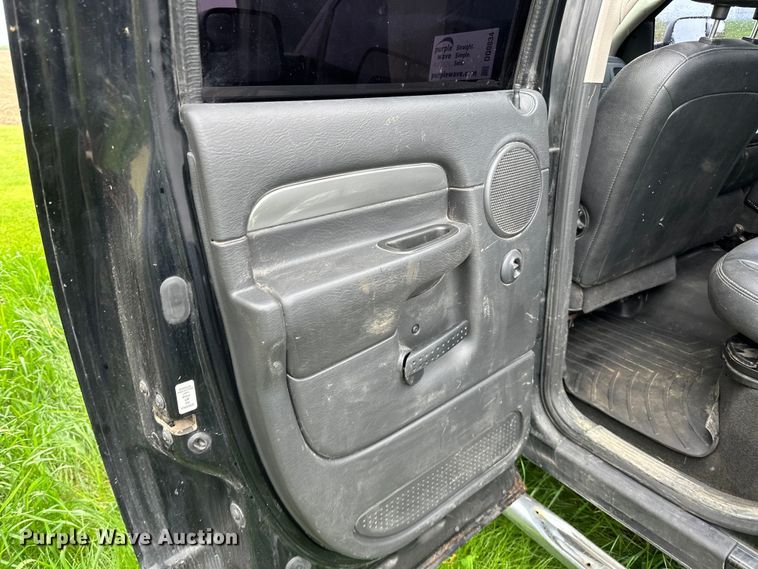 image for item DQ0834 2005 Dodge  Ram 3500 Quad Cab flatbed pickup truck