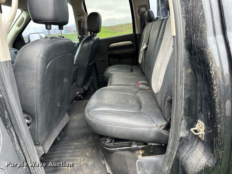 image for item DQ0834 2005 Dodge  Ram 3500 Quad Cab flatbed pickup truck