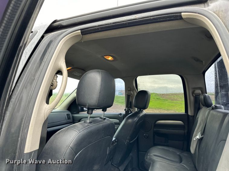 image for item DQ0834 2005 Dodge  Ram 3500 Quad Cab flatbed pickup truck