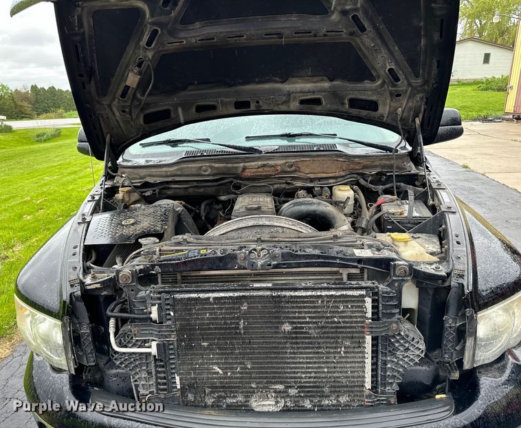 image for item DQ0834 2005 Dodge  Ram 3500 Quad Cab flatbed pickup truck