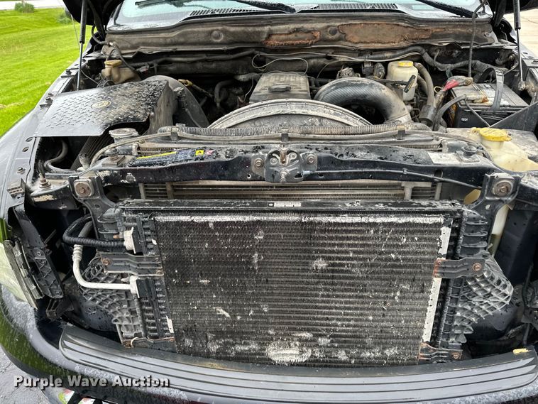 image for item DQ0834 2005 Dodge  Ram 3500 Quad Cab flatbed pickup truck