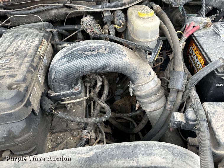 image for item DQ0834 2005 Dodge  Ram 3500 Quad Cab flatbed pickup truck