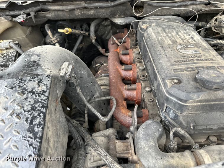 image for item DQ0834 2005 Dodge  Ram 3500 Quad Cab flatbed pickup truck