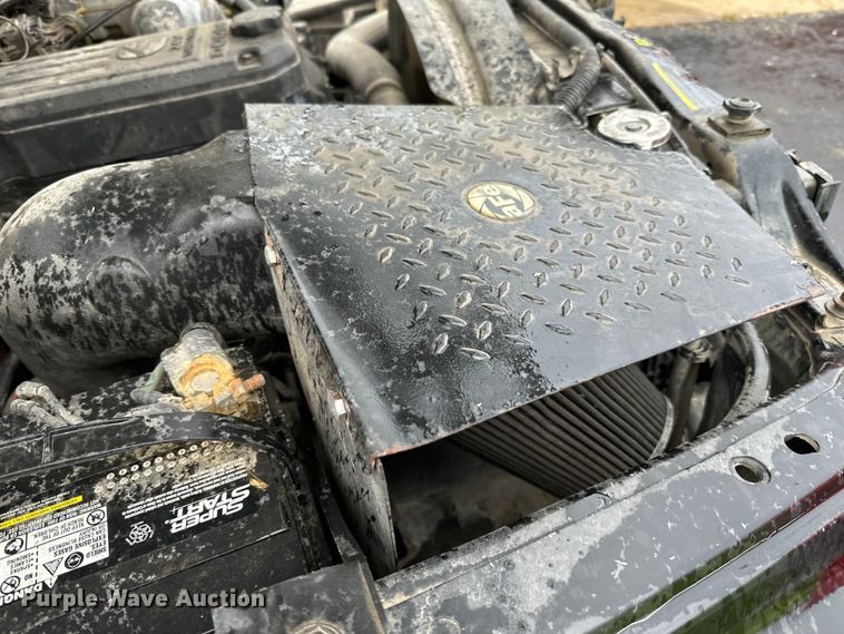 image for item DQ0834 2005 Dodge  Ram 3500 Quad Cab flatbed pickup truck