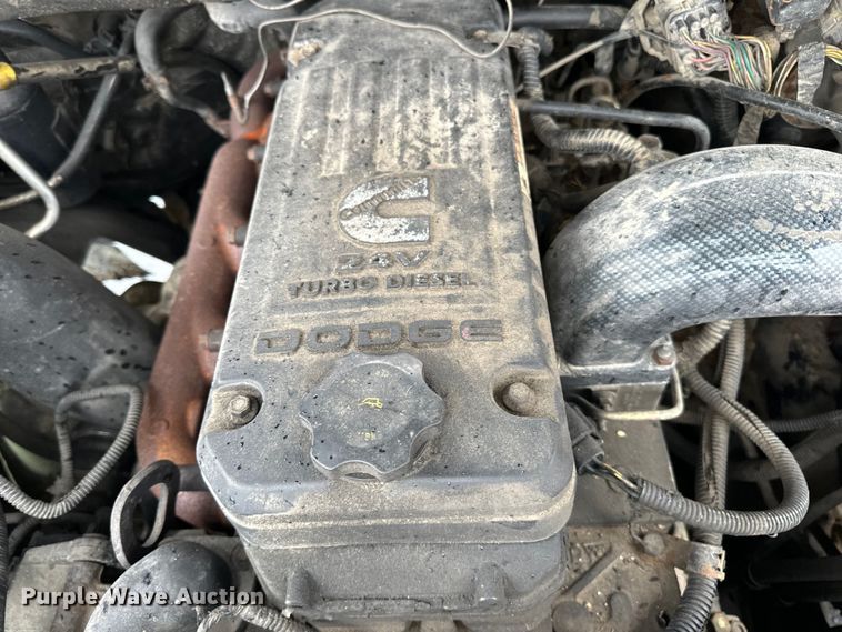 image for item DQ0834 2005 Dodge  Ram 3500 Quad Cab flatbed pickup truck