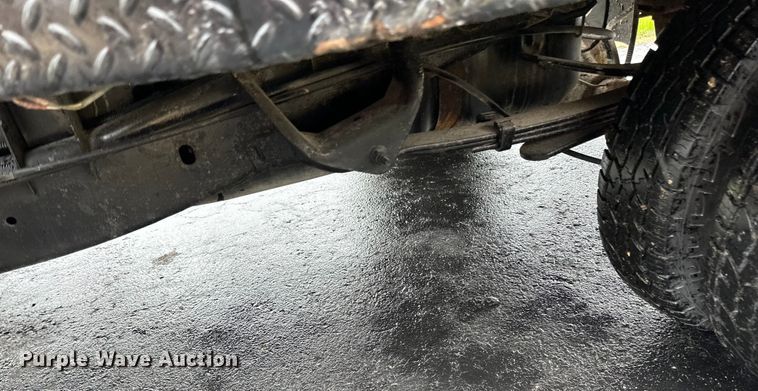 image for item DQ0834 2005 Dodge  Ram 3500 Quad Cab flatbed pickup truck