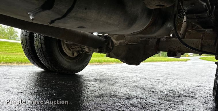 image for item DQ0834 2005 Dodge  Ram 3500 Quad Cab flatbed pickup truck