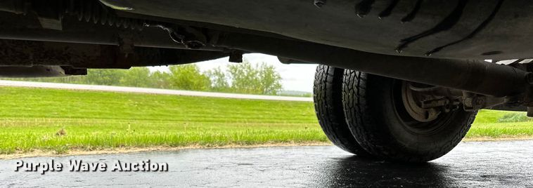 image for item DQ0834 2005 Dodge  Ram 3500 Quad Cab flatbed pickup truck