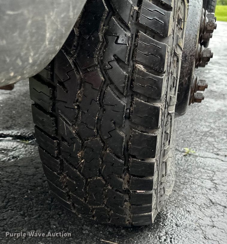 image for item DQ0834 2005 Dodge  Ram 3500 Quad Cab flatbed pickup truck