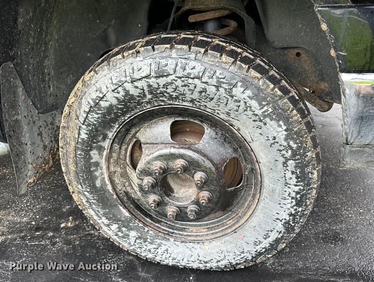 image for item DQ0834 2005 Dodge  Ram 3500 Quad Cab flatbed pickup truck