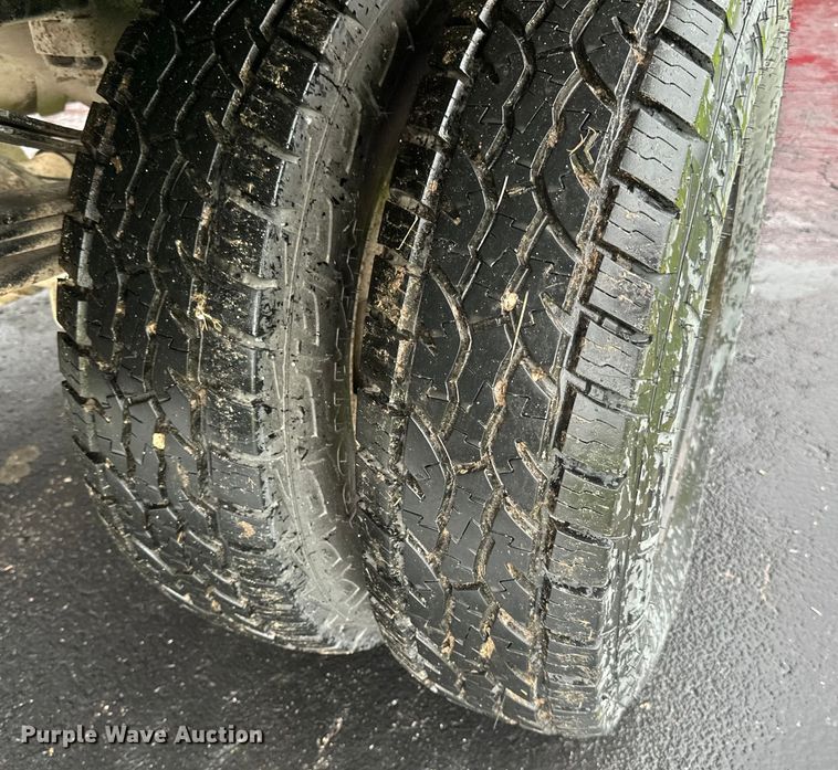 image for item DQ0834 2005 Dodge  Ram 3500 Quad Cab flatbed pickup truck