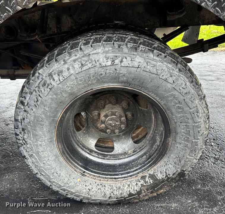 image for item DQ0834 2005 Dodge  Ram 3500 Quad Cab flatbed pickup truck