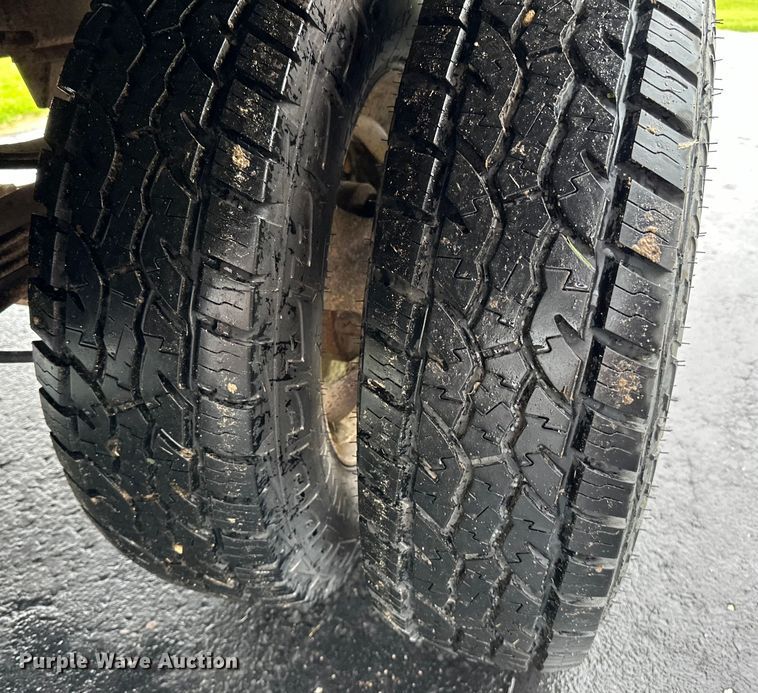 image for item DQ0834 2005 Dodge  Ram 3500 Quad Cab flatbed pickup truck