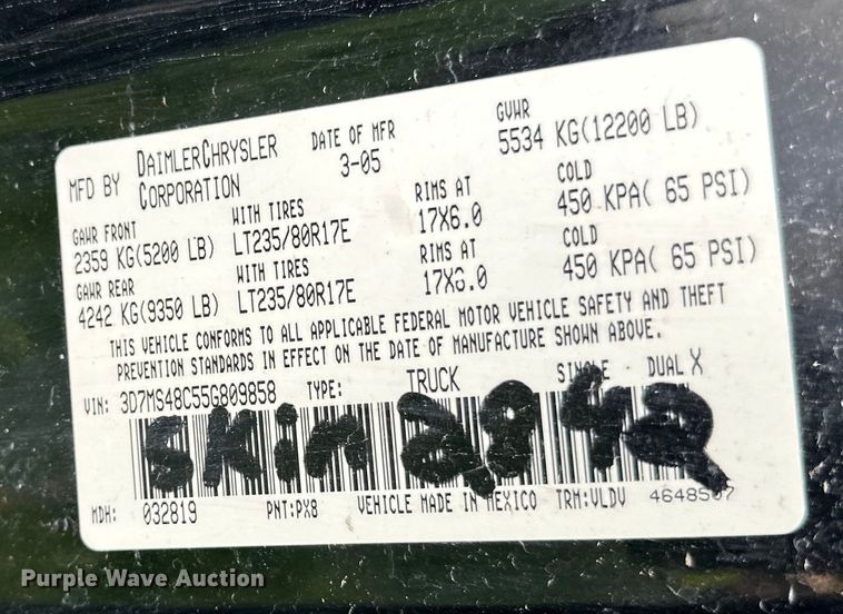 image for item DQ0834 2005 Dodge  Ram 3500 Quad Cab flatbed pickup truck