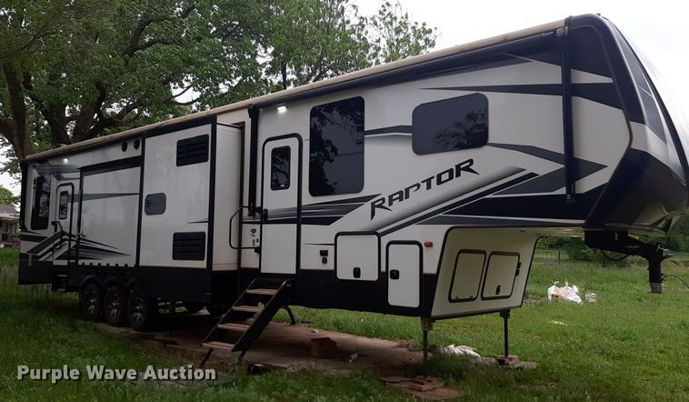 image for item DQ7055 2022 Keystone Raptor toy hauler camper