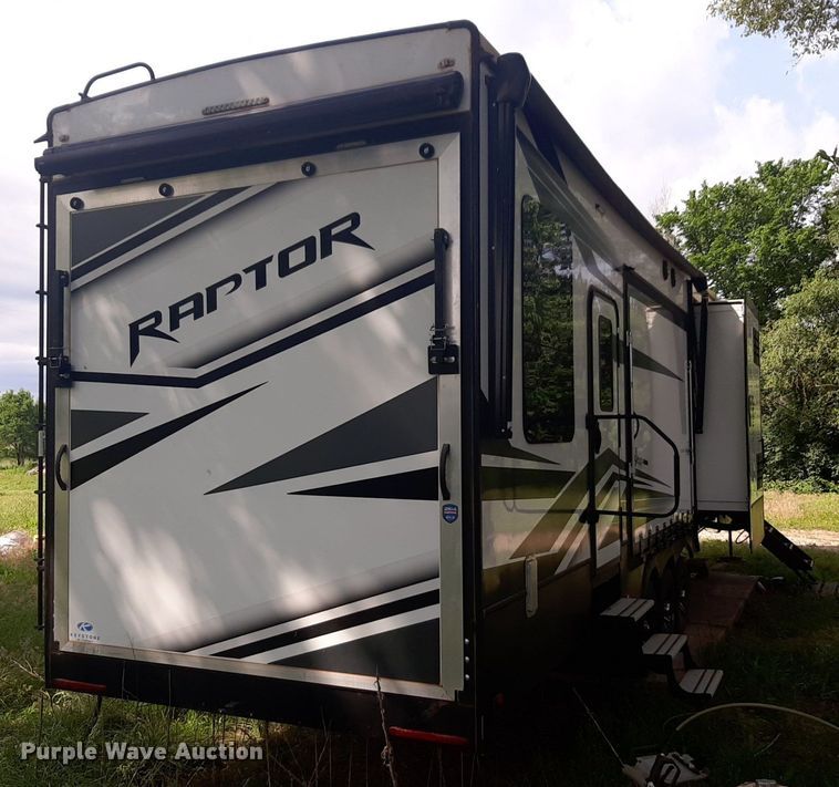 image for item DQ7055 2022 Keystone Raptor toy hauler camper