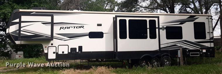 image for item DQ7055 2022 Keystone Raptor toy hauler camper