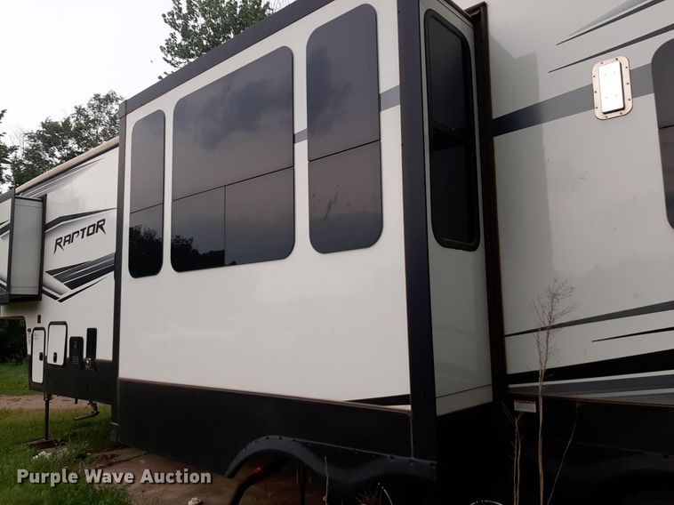 image for item DQ7055 2022 Keystone Raptor toy hauler camper