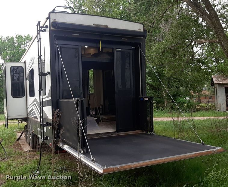 image for item DQ7055 2022 Keystone Raptor toy hauler camper