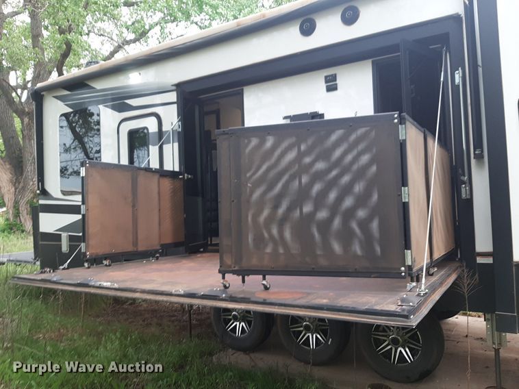 image for item DQ7055 2022 Keystone Raptor toy hauler camper