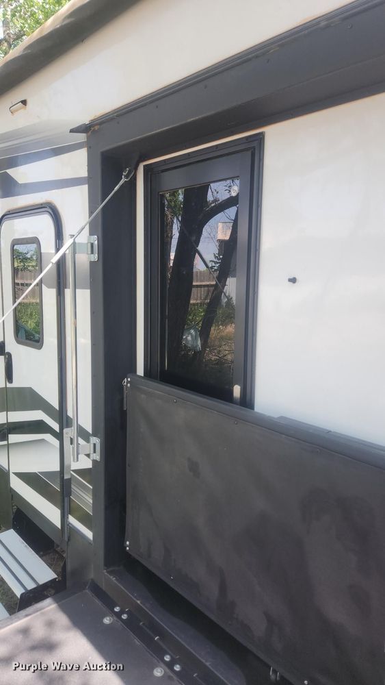 image for item DQ7055 2022 Keystone Raptor toy hauler camper