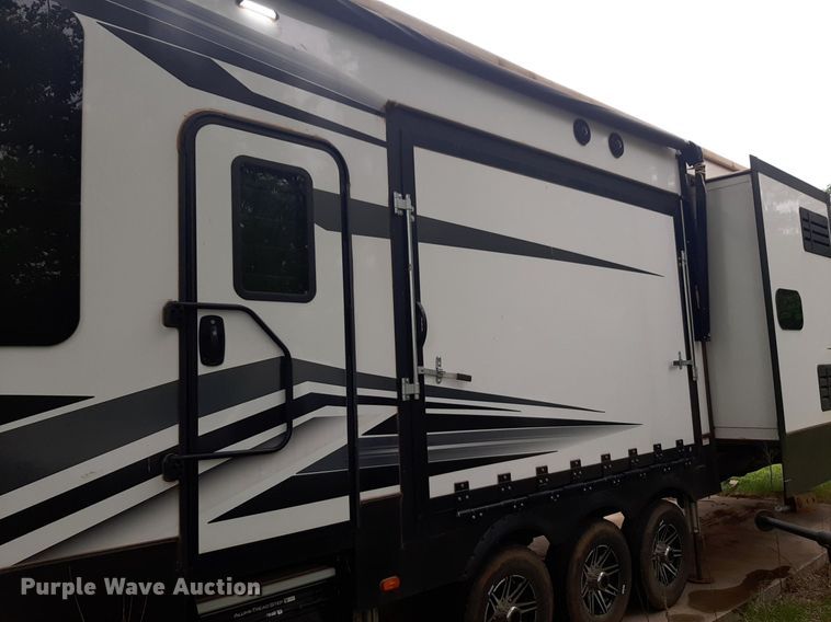 image for item DQ7055 2022 Keystone Raptor toy hauler camper