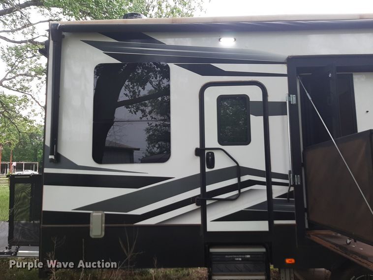 image for item DQ7055 2022 Keystone Raptor toy hauler camper